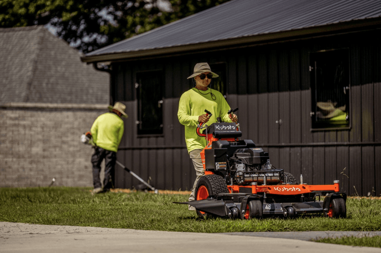 Landscapers working on lawn
