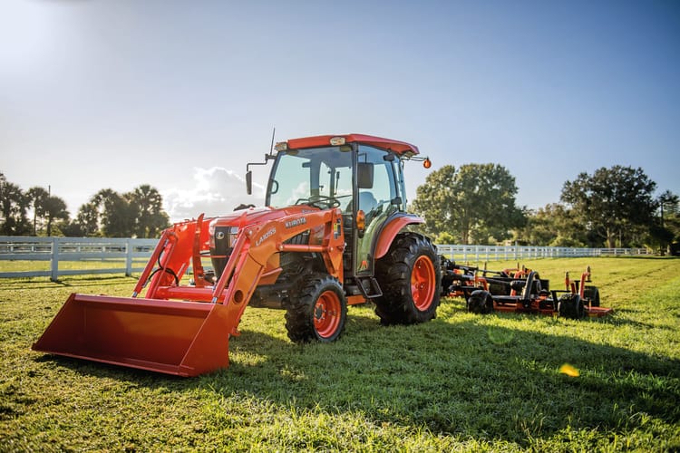 grand l60 parked in grass