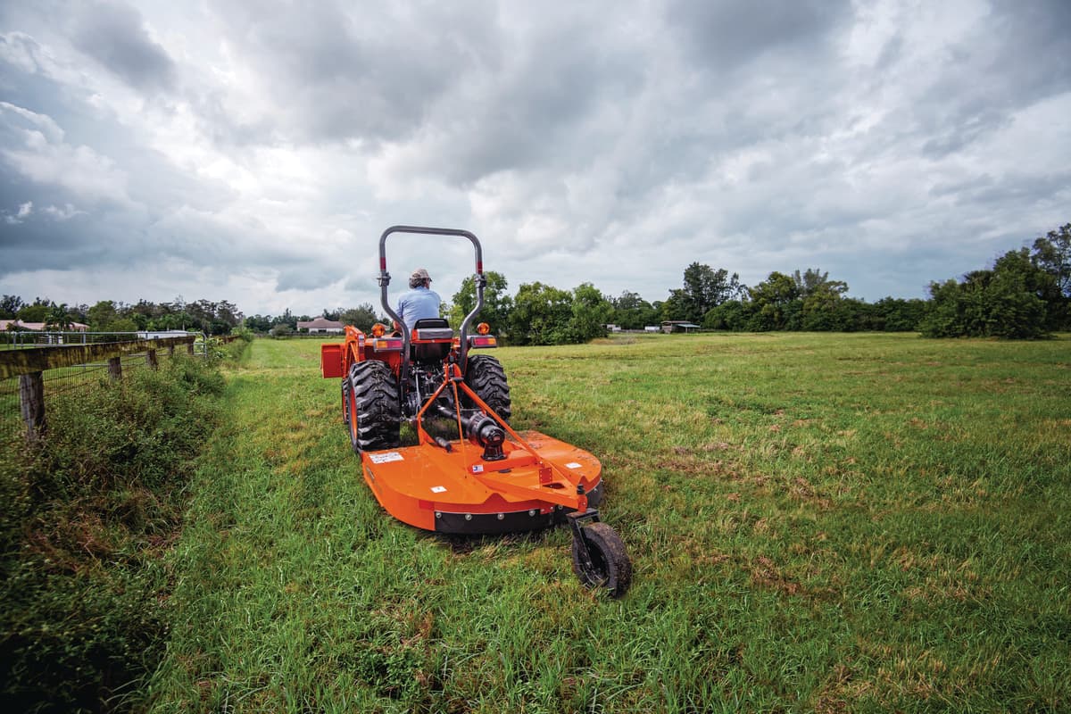 Kubota L2502 with Rotary Cutter