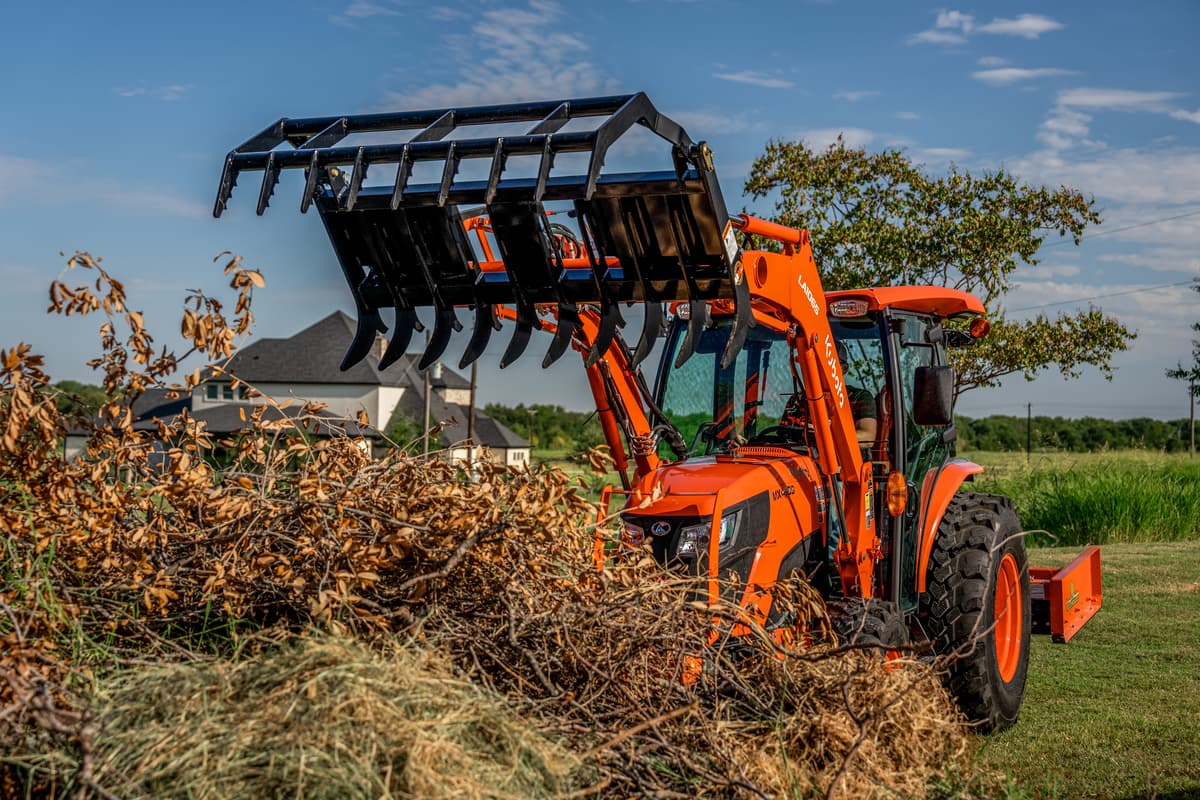 Kubota MX Tractor with claw grapple